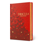 Red book titled 'Dracula' by Bram Stoker with gold lettering on a white background