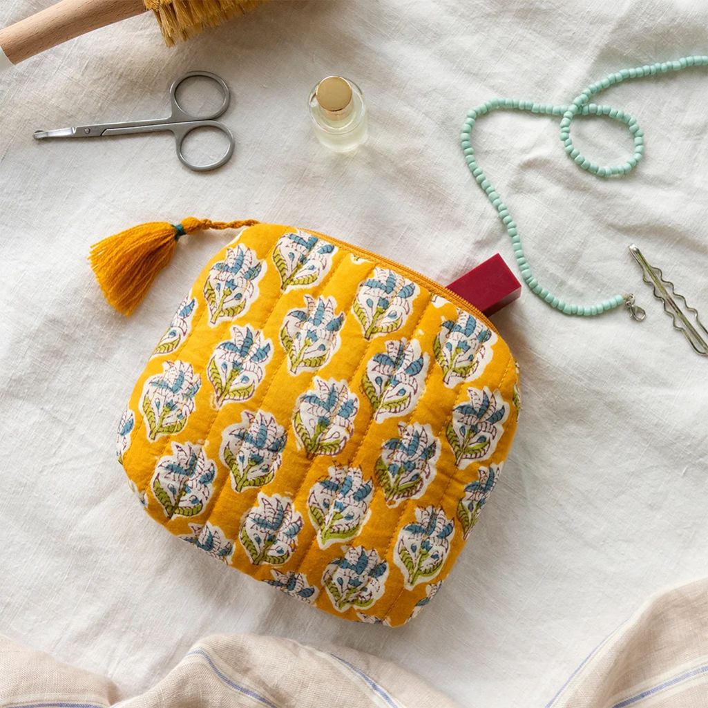 Yellow Floral Quilted Pouch Lifestyle shot