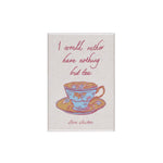 Magnet with a teacup design and text on a white background