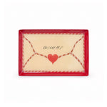 enamel tray in red and cream with 'amour' text and heart