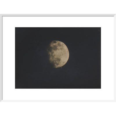 Photograph of the Moon print in white frame