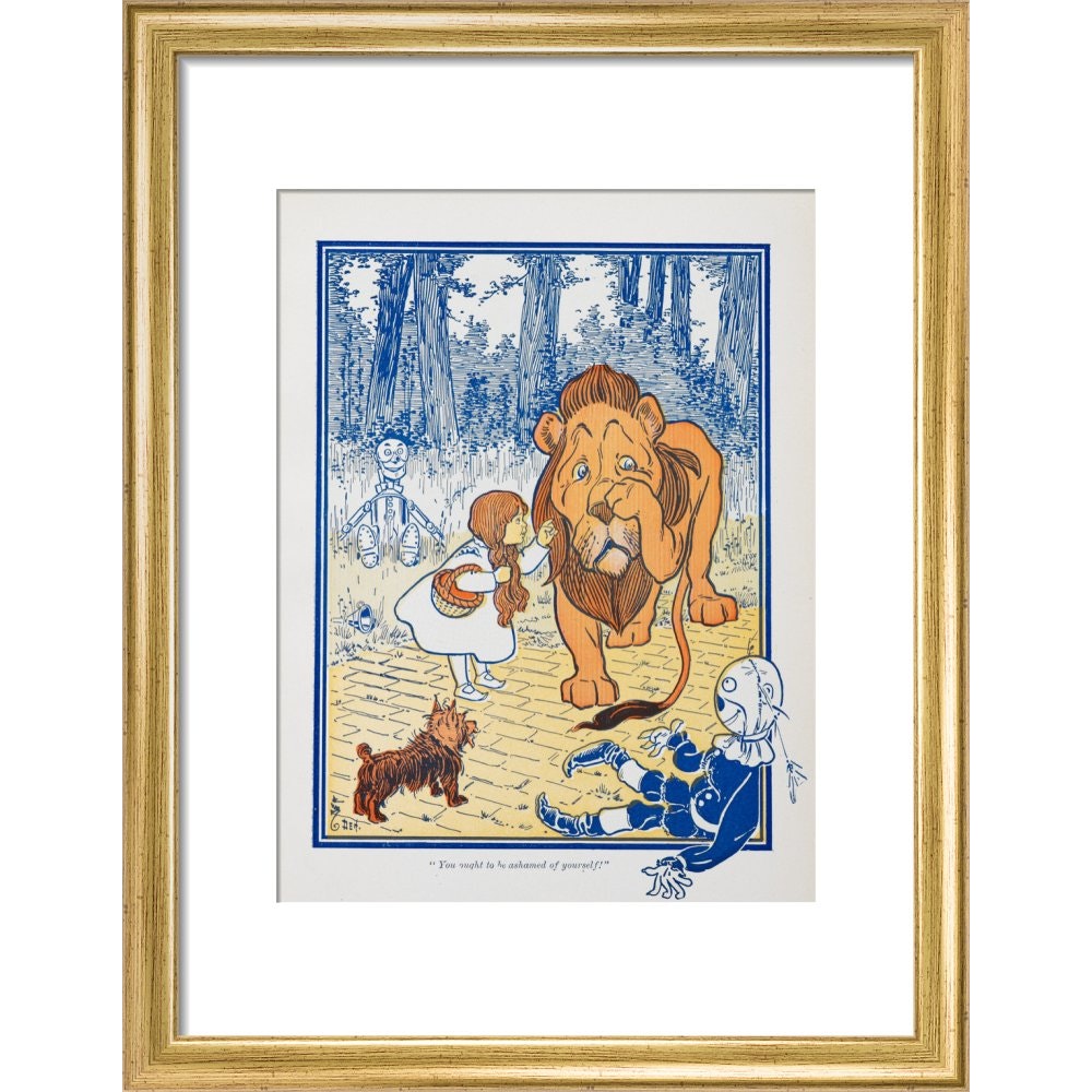 The Cowardly Lion print in gold frame
