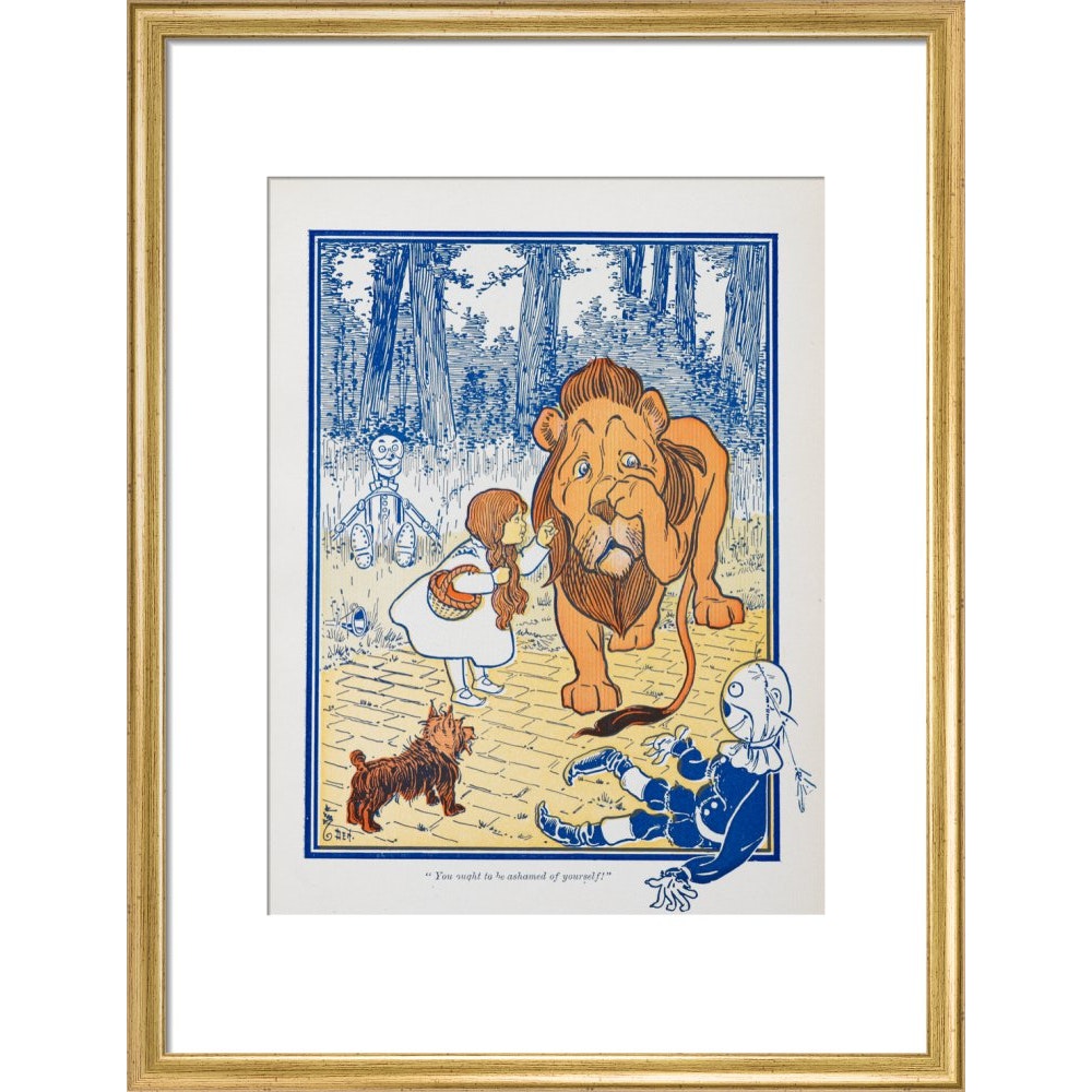 The Cowardly Lion print in gold frame