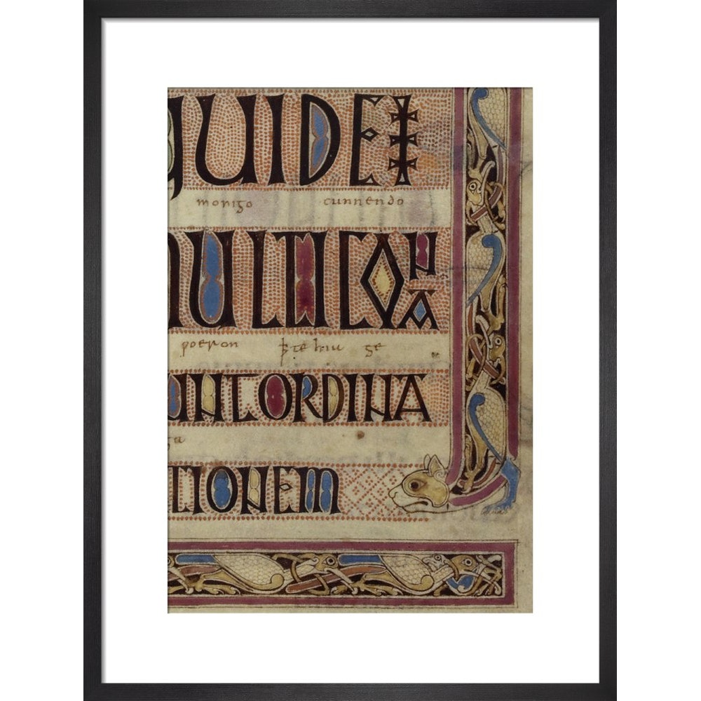 Detail of a cat, from a page of the Lindisfarne Gospels print in black frame