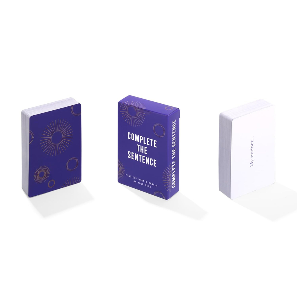 Purple card game box with text on a white background