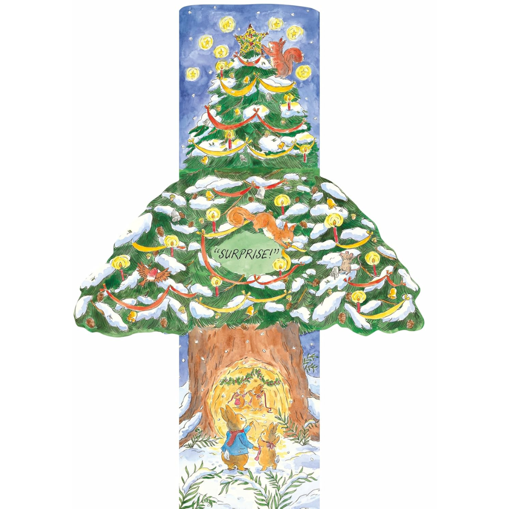 Decorative Christmas tree with animals and snow, featuring the word 'Surprise'.