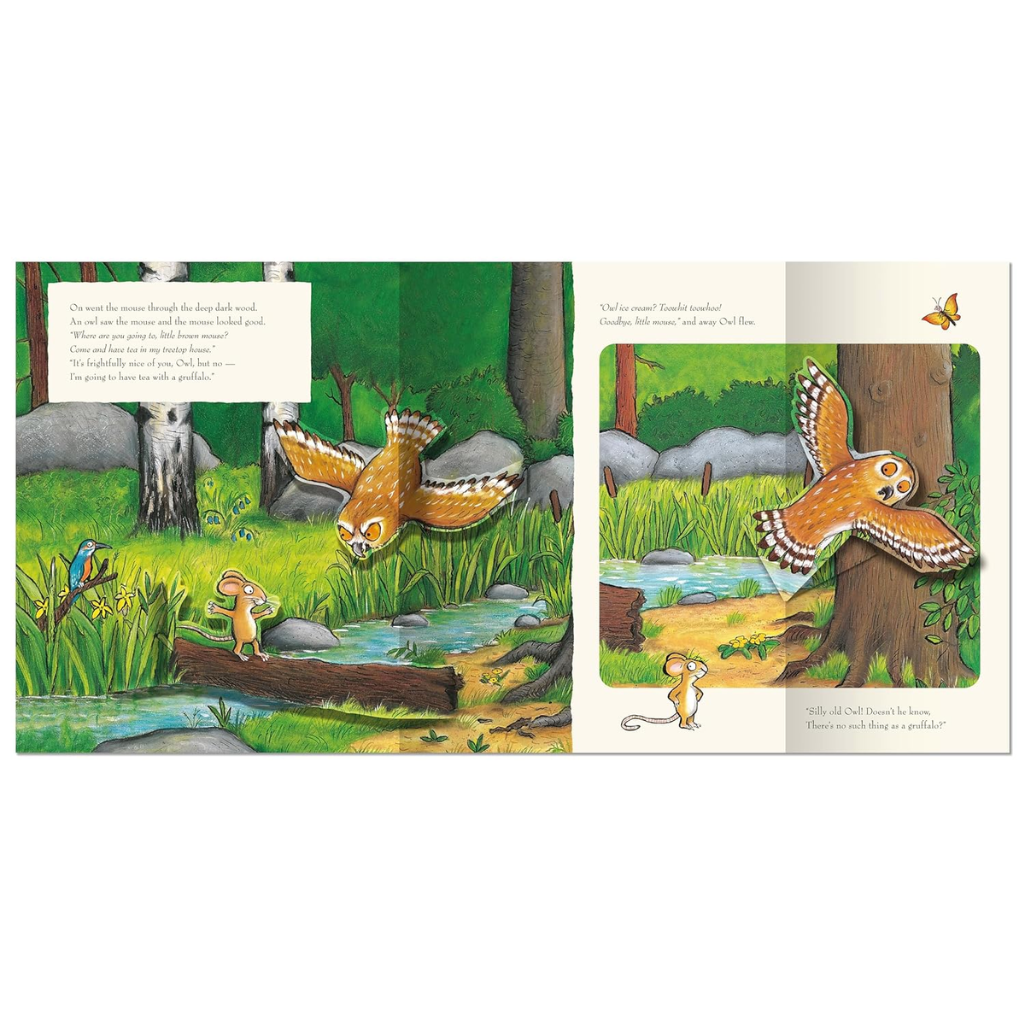 Illustrated book pages with an owl and other animals in a forest setting