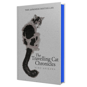 Book cover of 'The Travelling Cat Chronicles' with a cat illustration on a white background