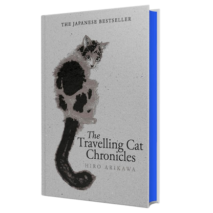 Book cover of 'The Travelling Cat Chronicles' with a cat illustration on a white background
