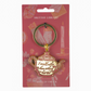 Teapot-shaped keychain with 'I would rather have nothing but tea' text on a pink British Library packaging.