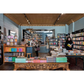 Interior of a bookstore with bookshelves and a counter.