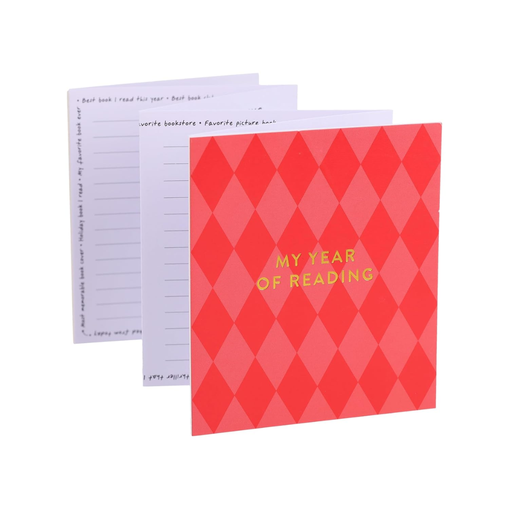 Two notebooks, one red with 'My Year of Reading' text and the other white with text on a white background.
