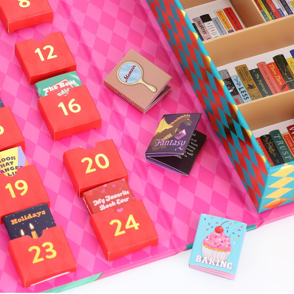 Book advent calendar with numbered doors on a pink background