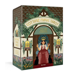 Cottage Magic Tarot box with illustration of a woman and cats in front of a house.