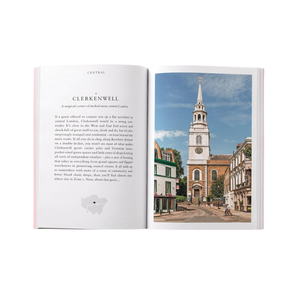 Open book showing text on one page and a photograph of a church spire on the other, with a white background.