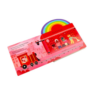 Children's book with a colorful train and rainbow design on a white background
