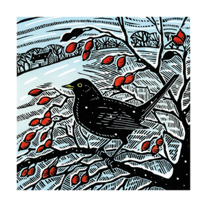 Christmas card with blackbird on branch with berries