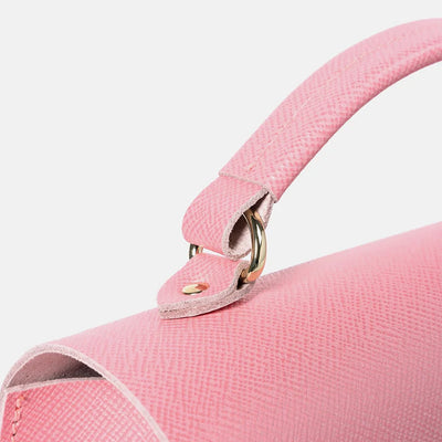 The Poppy Salmon Pink Saffiano, close up of clasp