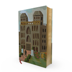 Book with a cover design of a cityscape and people, titled 'Great Expectations'.