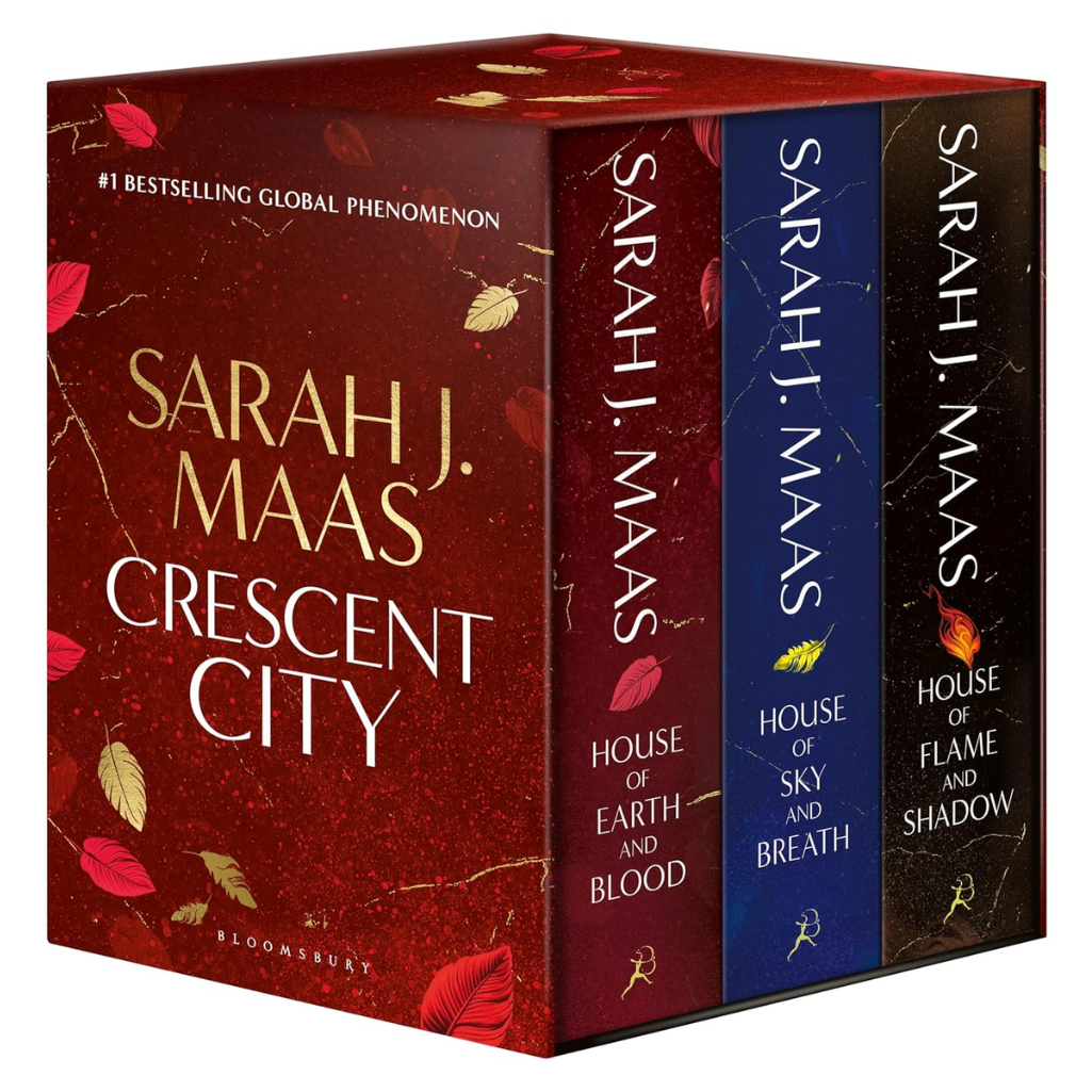 Box set of books by Sarah J. Maas with colorful covers and leaf designs.