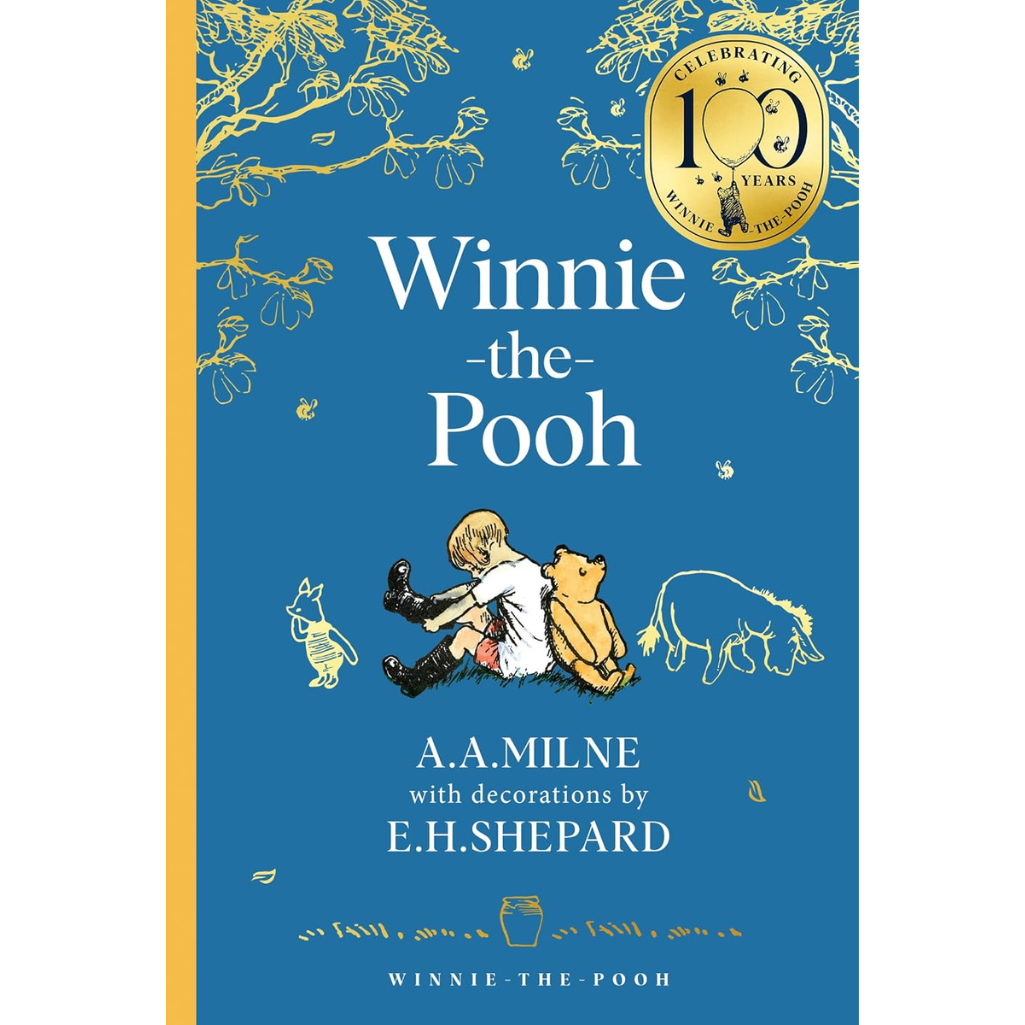 Book cover of 'Winnie-the-Pooh' with illustrations and decorative elements on a blue background.