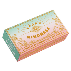 Box of 'Spark Kindness' with pastel gradient and gold text on a white background