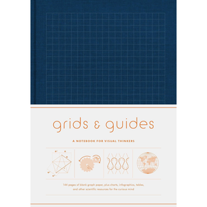 Notebook with grid design on cover and text 'grids & guides' on a white background