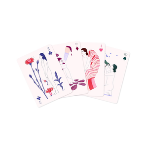 Set of playing cards with artistic illustrations on a white background