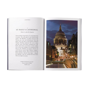 Open book with text and photograph of St. Paul's Cathedral at night