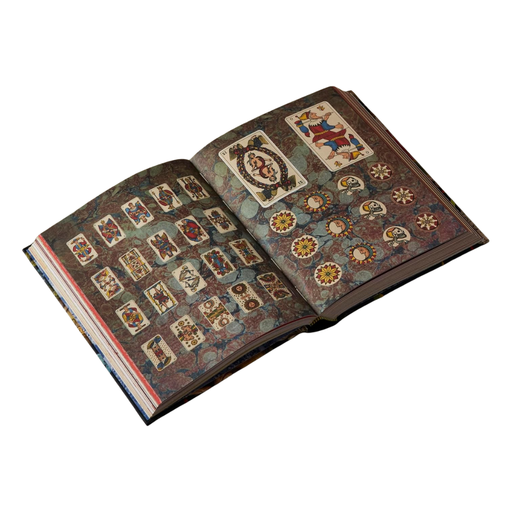 Open book with decorative pages on a white background