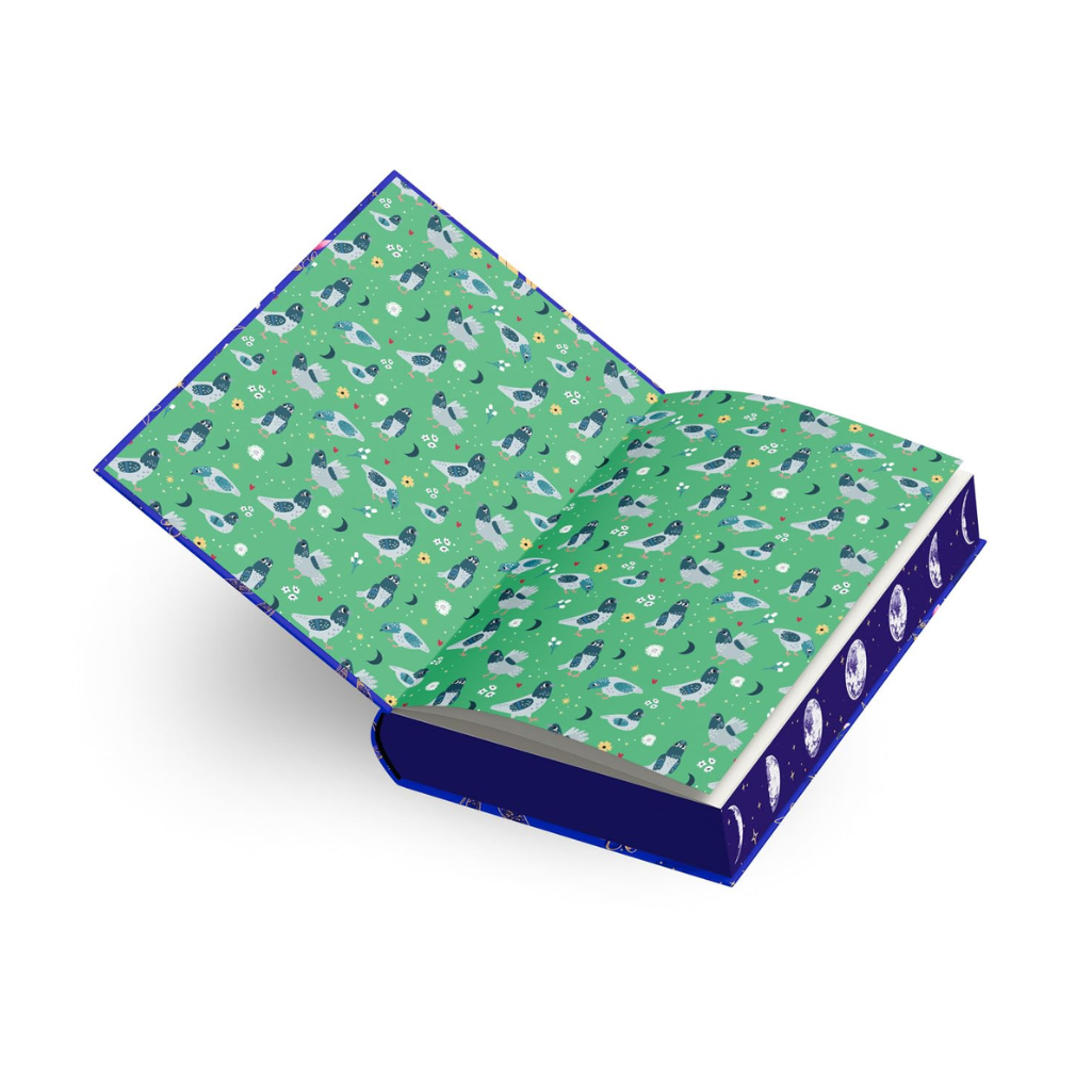 Open notebook with green and blue pattern on a white background