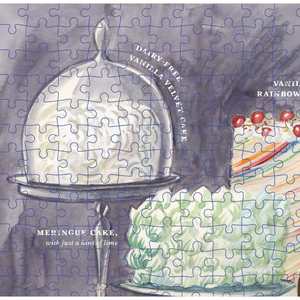 Partial puzzle of a dessert illustration with a silver cloche and cake.