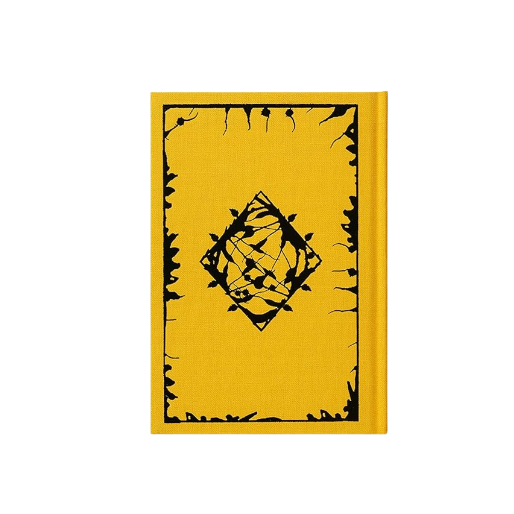 Yellow book with black decorative design on a white background