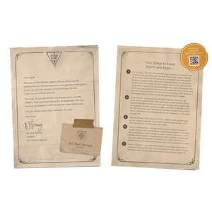 Two pieces of paper with text and a small envelope on a white background