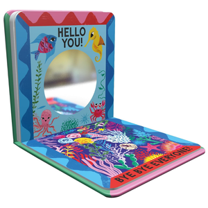 Children's book with colorful underwater illustrations and a mirror on a white background