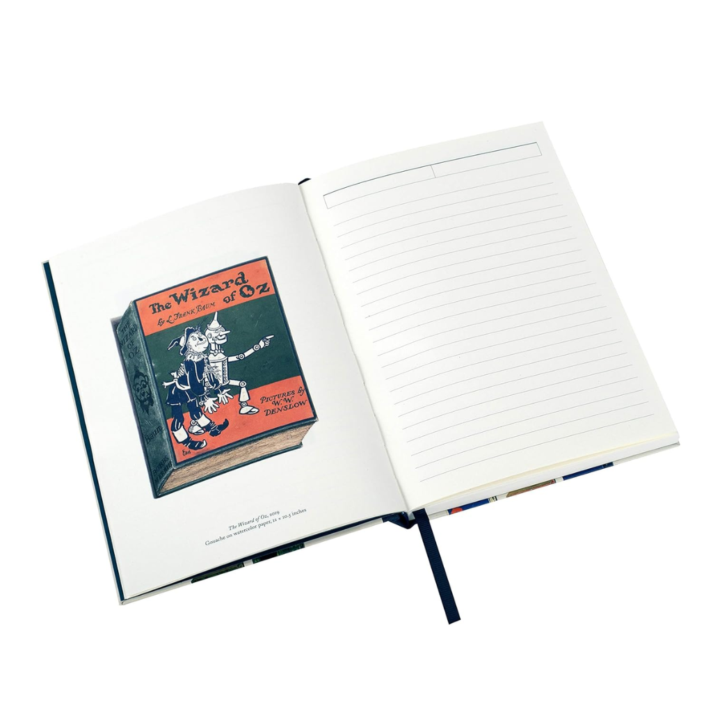 Open notebook with 'The Wizard of Oz' book design on the cover