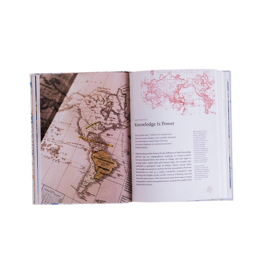 Open book showing world maps on a white background