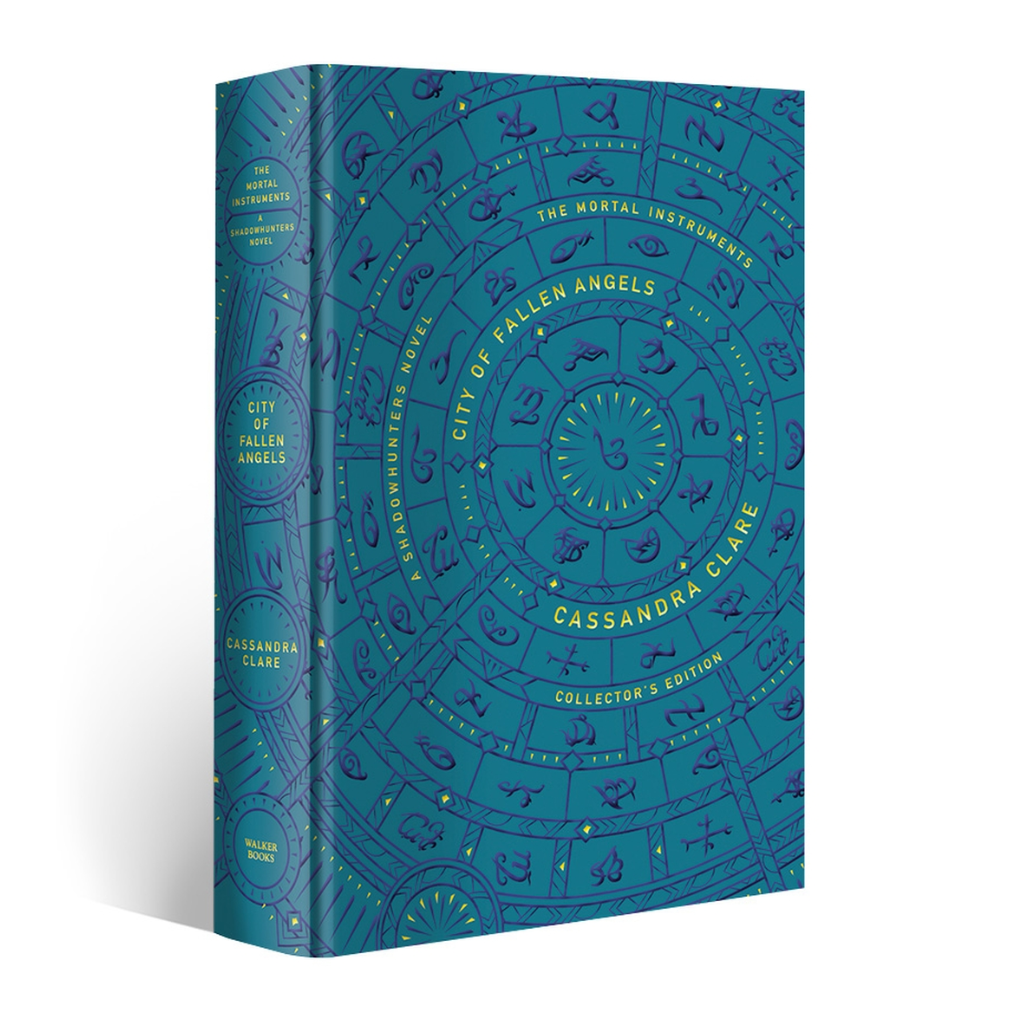 Blue book titled 'City of Fallen Angels' from 'The Mortal Instruments' series on a white background