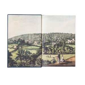 Open book with illustrations of a landscape and people in a field