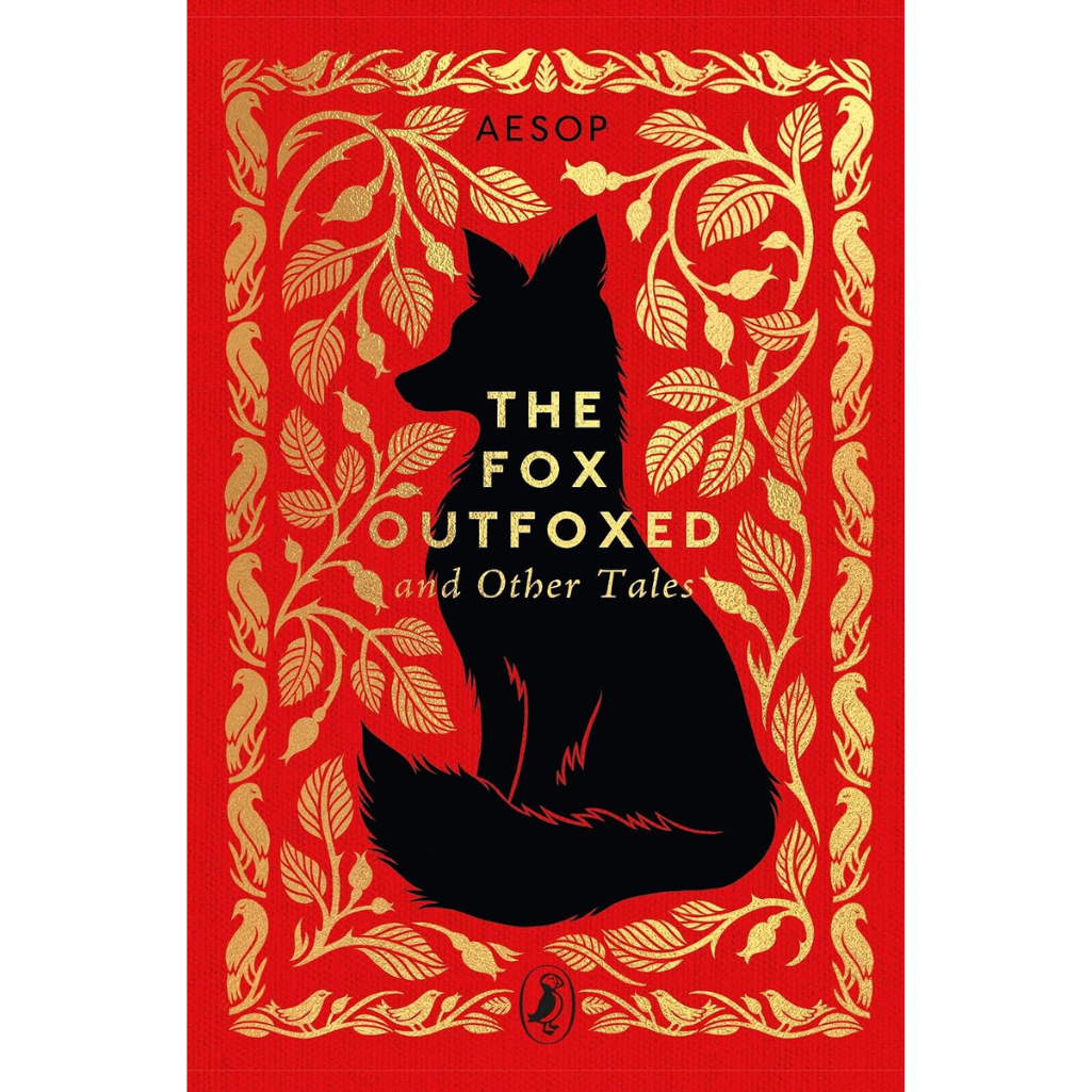 The book cover of 'The Fox Outfoxed and Other Tales' by Aesop, featuring a bold black silhouette of a fox centered on a vibrant red background with an ornate gold leaf border.