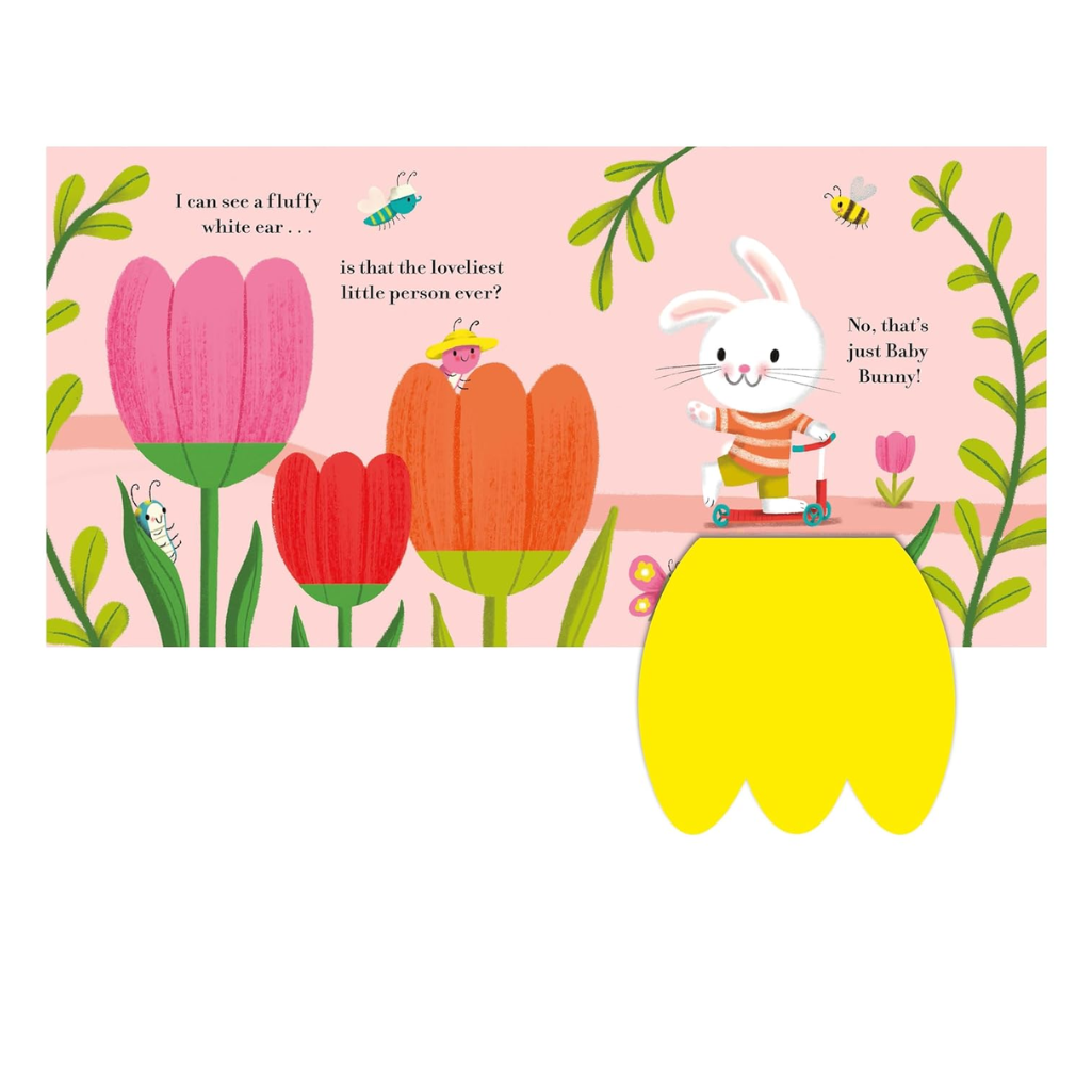 Children's book page with a cartoon rabbit and flowers on a pink background