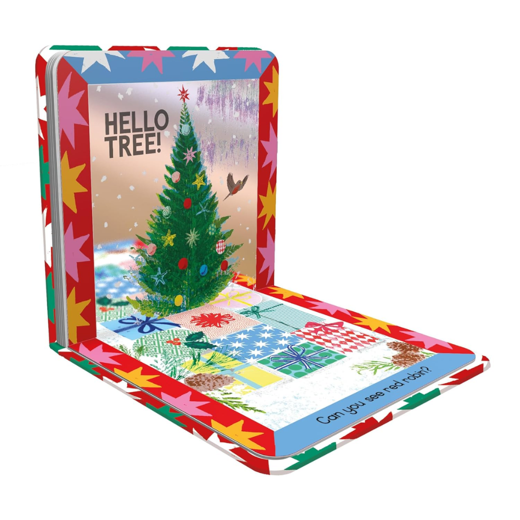 Children's book with a Christmas tree illustration on a white background