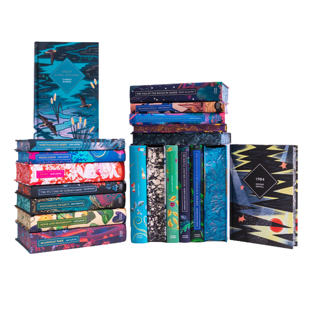 Collection of colorful books with various designs on a white background