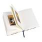 Open notebook with lined pages and a bookmark on a white background