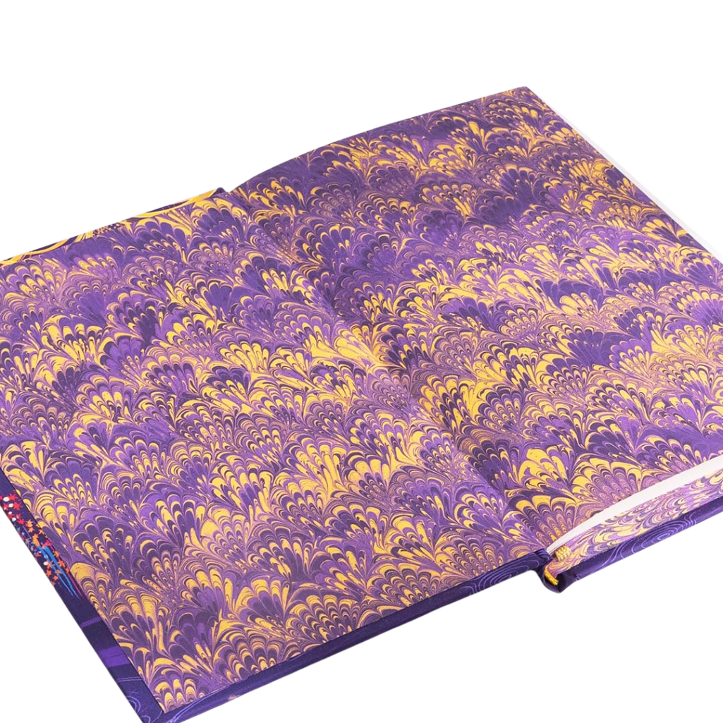 Purple and gold patterned fabric on a white background