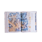 Open book displaying detailed illustrations of geological formations on a white background