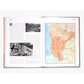 Open book showing a map and text on a white background
