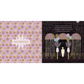 Decorative card with polka dot pattern and illustration of a garden scene with lights.