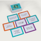 Educational card game with question cards and a storage box on a white background