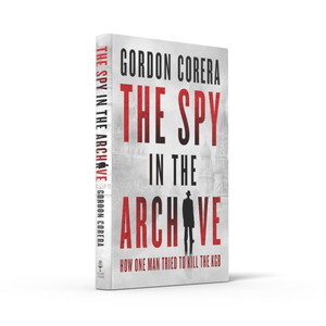 Book titled 'The Spy in the Archive' by Gordon Corera on a white background